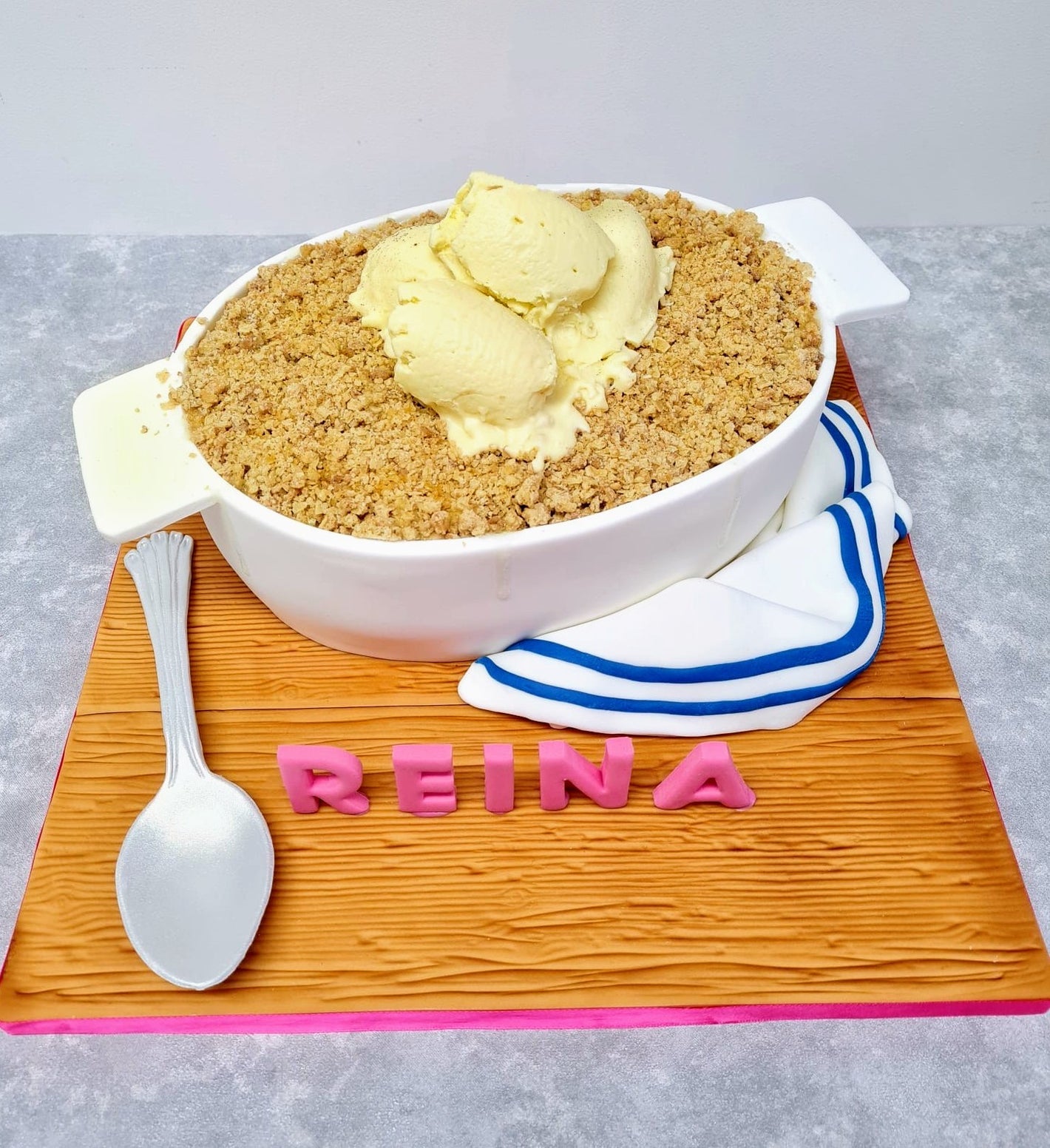 A Cake made to look like an Apple Crumple in an oven proof dish